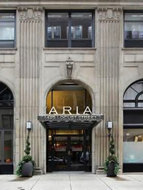Exterior of The Aria luxury condo building